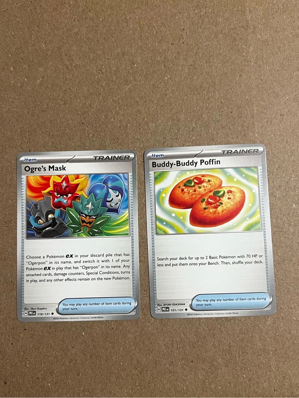 Pokémon TCG Trainer Cards. Ogre's Mask 118/131 And Buddy-Buddy Poffin 101/131